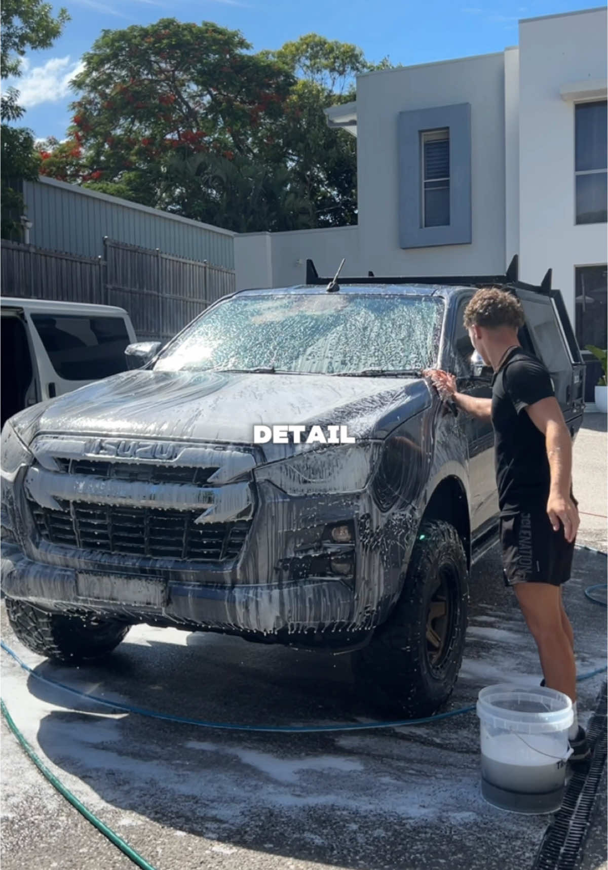 Beau McClymont working on a customer Isuzu D-Max at A1 Auto Styling